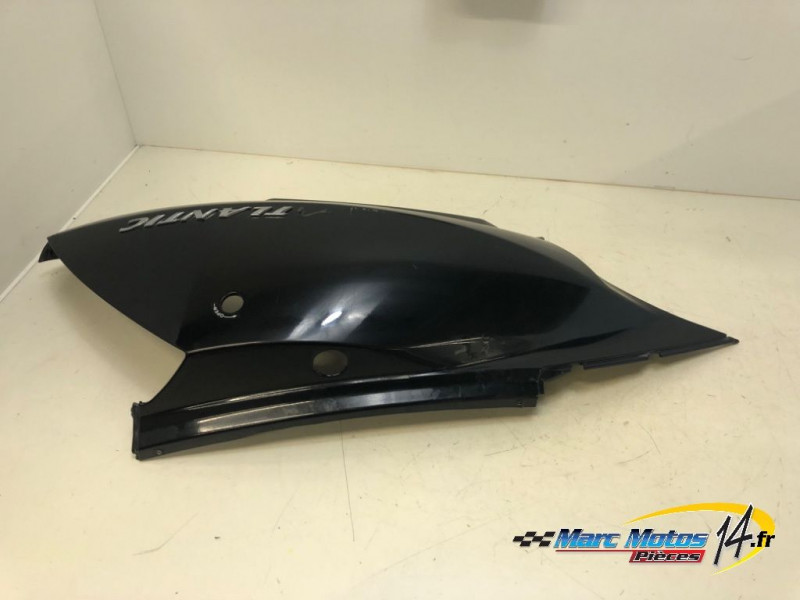 CACHE LATERAL GAUCHE APRILIA 125 ATLANTIC 2009