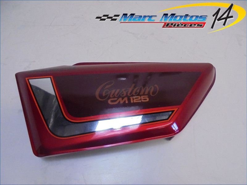 CACHE LATERAL GAUCHE HONDA 125 CMC 1991