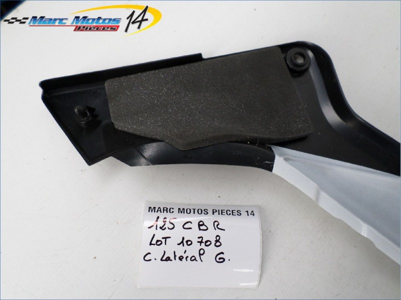 CACHE LATERAL GAUCHE HONDA 125 CBR 2005